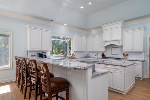 Expansive gourmet kitchen with seating at the counter for 5.