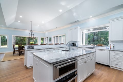 Expansive gourmet kitchen with seating at the counter for 5.