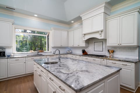 Well stocked kitchen and prep island for your gourmet meals.