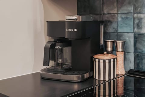 Coffee lovers will appreciate the Keurig Duo, offering the flexibility to brew both K-Cups and fresh local ground coffee—both of which are thoughtfully provided for your stay.