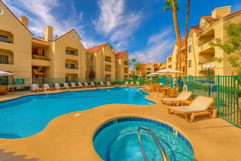 Stretch out on sun loungers around the expansive pool.