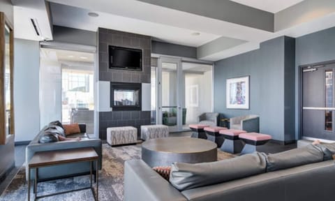 Kick back in comfort! This gray modern living room is your calm after the day’s of adventure!