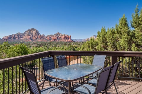 Deck off living room with a dining table