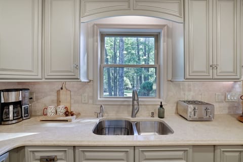 Kitchen with under-mount lights, hot-water on demand, tons of storage cabinets