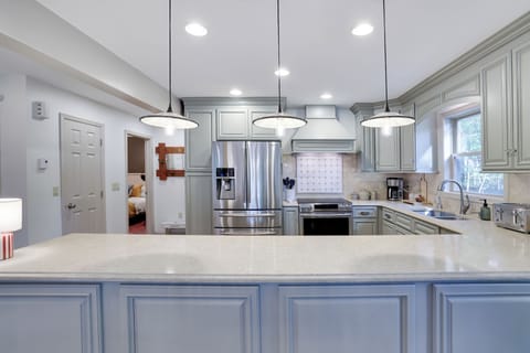 Spacious luxury kitchen with quartz counters & Stainless Steel appliances