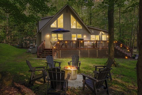 Vintage charm, forest calm, lake views & sunset bliss.  4 Bedrooms & loft.