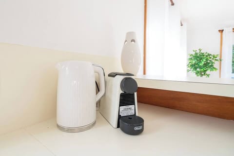 Savour a freshly brewed DeLonghi espresso—the perfect start to a peaceful morning before heading out to explore Port Arthur.