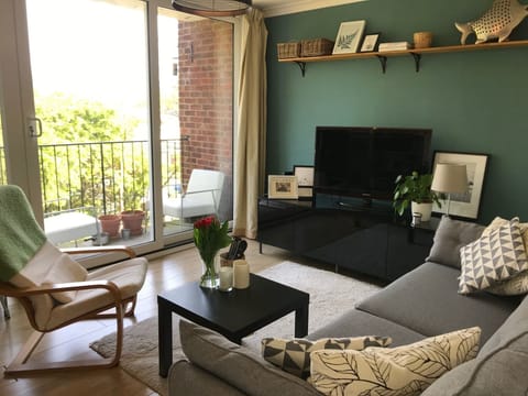 Large Living room with dining table and beautiful French patio window
