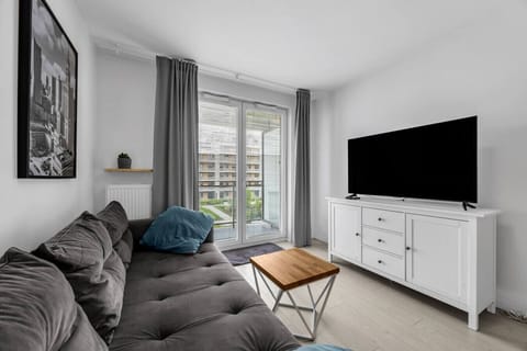 Living Room with Sofa Bed, Smart TV and Dining Table | Book Now with RENTUJEMY.COM