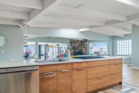 Kitchen with ocean views in the background.