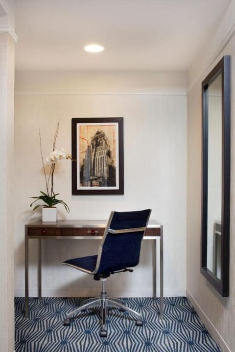 Focus and create at a sleek desk with soft lighting.