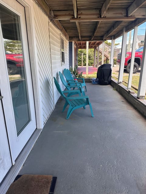 Porch with gas grill and seating
