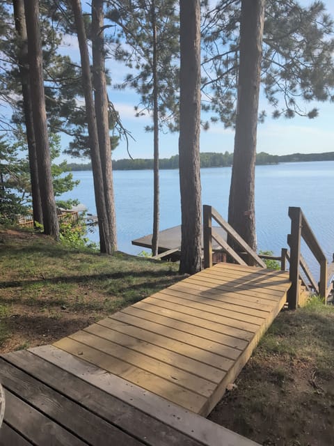 from the lake to the house, you've got a wooden walkway.