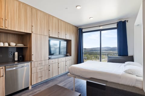 This Cozy Studio in Park City has amazing views right from your room! A comfortable murphy bed that folds up for extra space during the day.