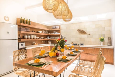 The open dining and kitchen spaces are perfect for entertaining