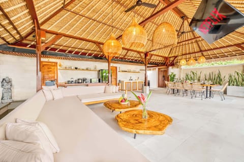 An inviting blend of warmth, wood, and woven light, crafted for connection and calm