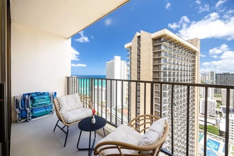 This private balcony is your perfect spot to relax and take in the captivating blend of ocean blue and urban charm.