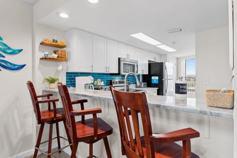 The extra bar seating is perfect for casual bites or easy conversation.