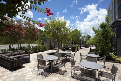 Gather outdoors for coffee and conversation on the breezy terrace.