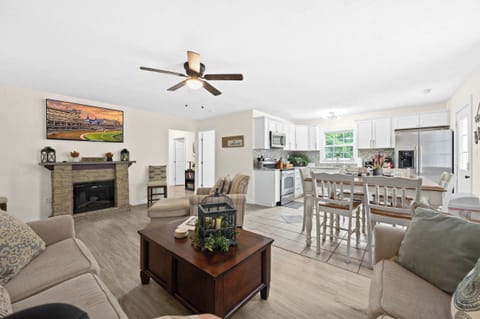 Living Room: Sink into comfort. This inviting living room is the perfect spot to gather, chat, or simply put your feet up