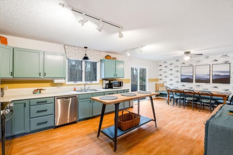 Enjoy our modern fully stocked kitchen- perfect for cooking meals with ease.