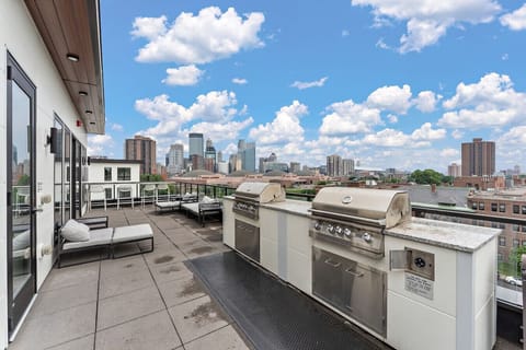 Rooftop Retreat: Sizzle your favorite meals on the grill while soaking up stunning city views!