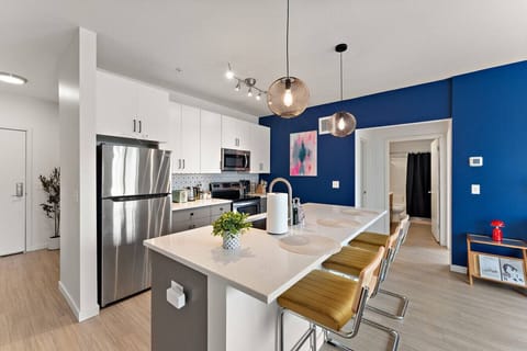 Kitchen & Dining: Stylish setup with modern appliances and vibrant accents for delightful meals!