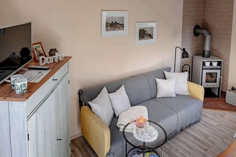 Wohnzimmer - Sofa & Kamin
