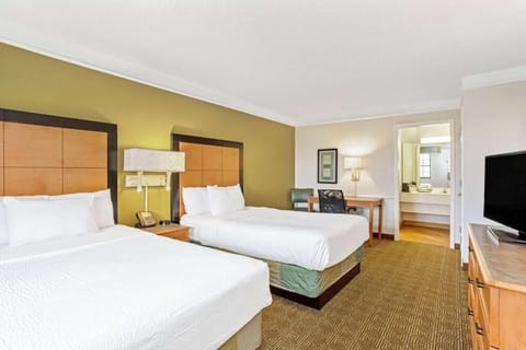 Get ready with ease near the vanity and seating area.