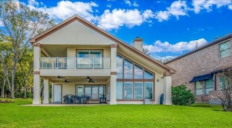 Back deck with expansive yard.