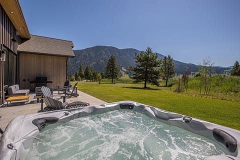 Enjoy the views from the patio hot tub!
