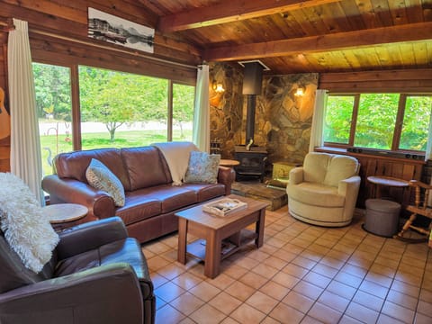 Seating: full-sized couch, recliner, swivel chair, and old fashioned rocker.