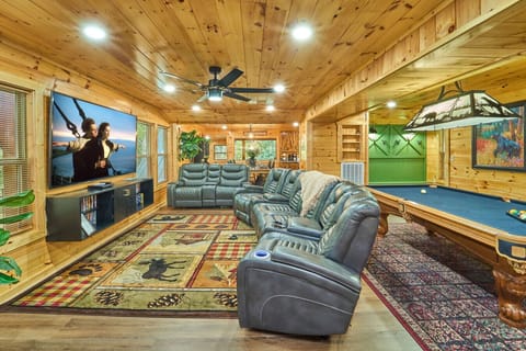 Rustic Cabin Living Room | Reclining Leather Sofas, Pool Table & Large TV | Warm Wood Interior