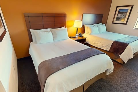 Sink into crisp linens after a day of exploring.