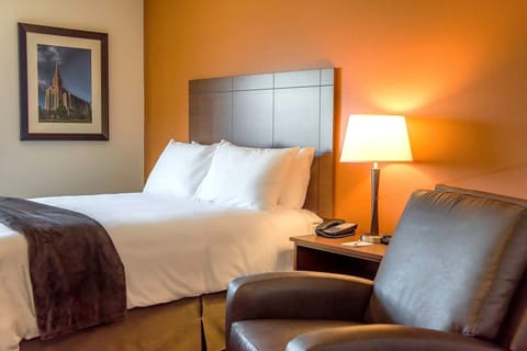 Unwind into crisp linens and soft lamplight for deep sleep.