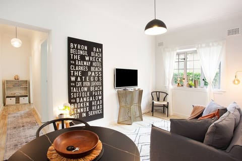 Living Room: Discover a stylish retreat with vibrant decor and modern comforts!