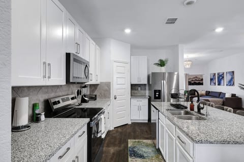 Fridge dispenses water and ice.