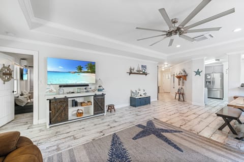 Relax, Unwind and Catch the Game or a Movie in the Inviting TV Area