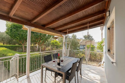 Shaded outdoor area with garden views