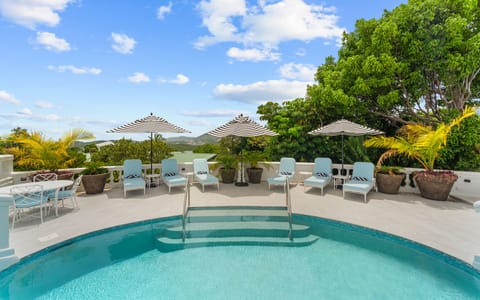 Poolside lounging with island breezes