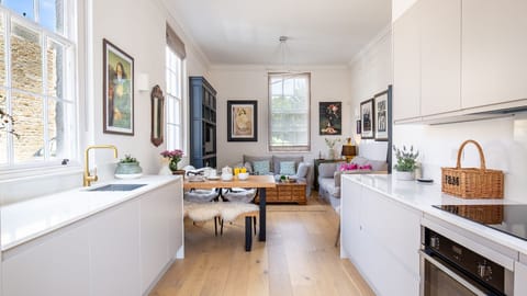 The open plan living area has been cleverly split into three zones.