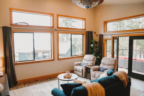 Cozy living room with large windows and beautiful views