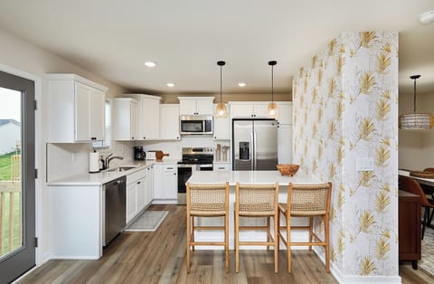 Fully Stocked kitchen with great views of pond 
