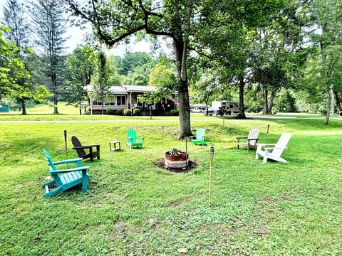 Fire-pit and Adirondack chairs for your use and enjoyment.