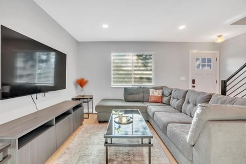 Unit B - Spacious living room with smart TV