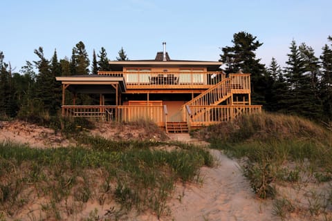 Private lakefront living, surrounded by dunes and pines.