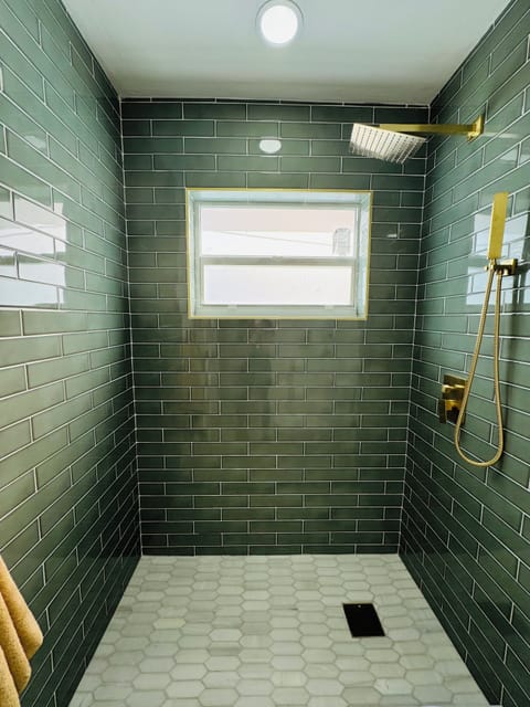 Relax in your private en-suite with sleek design and luxe details.