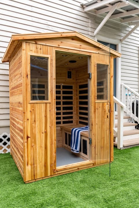 Step into the shared sauna and let the heat melt your stress away.