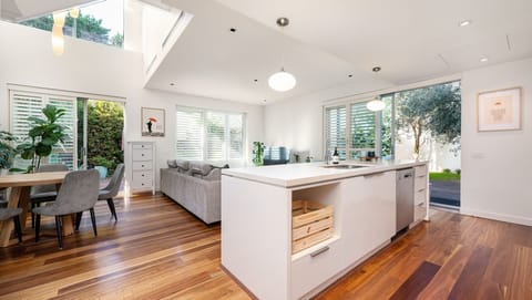 Open plan kitchen, living and dining space with loads of natural light