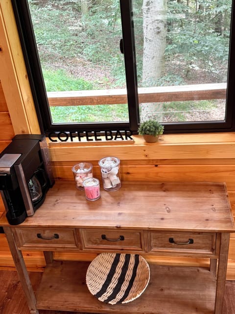Start your day at this cozy coffee bar with a peaceful window view